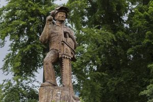 The Logging Show logger statue.
